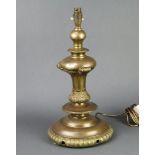 A gilt metal table lamp of baluster form raised on a spreading base 48cm h x 24cm