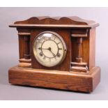 A Waterbury Clock Company 19th Century, 8 day striking clock with paper dial and Roman numerals,