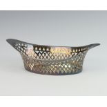 A silver pierced boat shaped dish, Sheffield 1930 16cm, 54 grams There are some minor dents