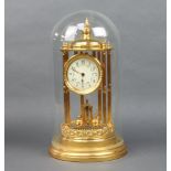 A German 400 day clock with 9cm porcelain dial, Arabic numerals, contained in a gilt metal case, the
