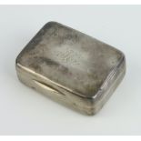 A George III silver rounded rectangular vinaigrette of plain form with engraved monogram and