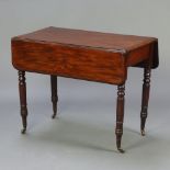 A Victorian mahogany Pembroke table fitted a frieze drawer, raised on turned supports 70cm h x