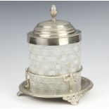 An Edwardian silver plated mounted cut glass biscuit barrel and stand