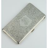 A large silver rectangular cigarette case engraved with scrolls and monogram, Birmingham 1919, gross