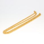 A yellow metal Continental necklace 61cm, 71.9 grams