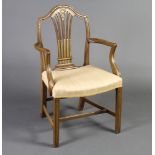 A Hepplewhite style painted open armchair with gilt swag decoration and overstuffed seat, raised