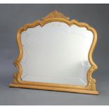 A Victorian style etched and cut glass over mantel mirror contained in a carved walnut frame 81cm
