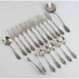 An 800 standard serving spoon and 10 forks, 5 similar coffee spoons, tongs and serving spoon, 260
