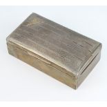 A rectangular silver Art Deco style cigarette box 16.5cm, marks rubbed The lid is dented and split
