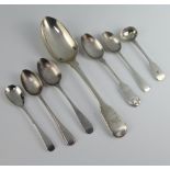A George III fiddle pattern silver table spoon with engraved monogram London 1813, 6 spoons 166