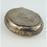 An oval silver tobacco box of plain form, Birmingham 1912, 7cm, 42 grams There are numerous dents to