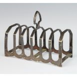 A silver Art Deco 7 bar toast rack, Sheffield 1932, 13cm, 148 grams