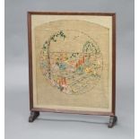 A 1930's oak fire screen with floral embroidered panel to the centre 67cm x 53cm x 13cm d