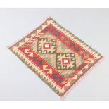 A tan, red and black ground Maimana Kilim rug with 2 stylised diamonds to the centre 96cm x 56cm