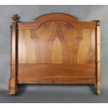 A 19th Century Continental walnut bed frame with arch shaped top 129cm h x 134cm w x 204cm l