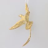 A yellow metal brooch in the form of an exotic bird 5.7 grams, 58mm