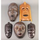 A Cmoii-Chokwe style tribal mask together with 4 others