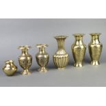 Two pairs of benares brass club shaped vases 8cm x 3cm and 15cm x 7cm, a Benares brass squat