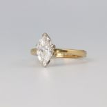 A yellow metal 18ct marquise single stone diamond ring size N 1/2, 4.1 grams, 10mm long, 6cm wide,