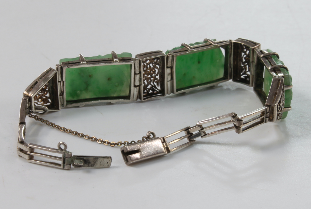 A white metal and 3 plaque carved green hardstone Art Deco bracelet, 16cm The central hardstone - Image 6 of 7