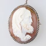 A 19th Century cameo portrait brooch of a gentleman in a silver frame, signed on the reverse The
