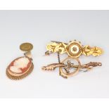 Two Victorian bar brooches - one 15ct gross weight with pin 3.3 grams, the other 9ct gross weight