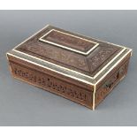 A 19th Century Indian carved hardwood and inlaid ivory trinket box with hinged lid 11cm h x 30cm w x