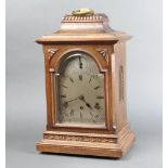 Kienzle, a Continental 8 day striking bracket clock with 17cm arched silvered dial contained in an