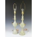 A pair of grey and gilt painted table lamps in the form of twin handled urns 43cm h x 16cm