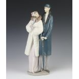 A Lladro figure "Evening Out" 1452 36cm The parasol has a stuck handle