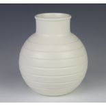 A Keith Murray Wedgwood white glazed ribbed baluster vase with printed mark 16cm This lot has some