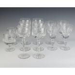 A suite of table glassware comprising 6 hocks, 4 wines and 2 brandy glasses, all engraved with