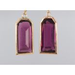A pair of 9ct yellow gold amethyst drop earrings, 42mm, 9.49 grams Both earrings have minor chips to