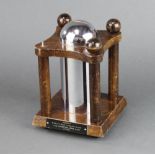 An Art Deco Masonic oak and chrome dome shaped alms/collecting box 21cm x 15cm x 15cm 1 finial