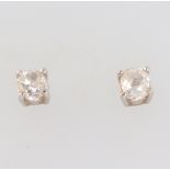 A pair of 18ct white gold mine cut single stone diamond ear studs. approx. 0.25ct each, 1.1 grams