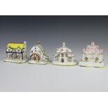 Four Coalport cottages - The Country Cottage 12cm, The Watermill 12cm, The Parasol House 10cm and