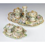 A 19th Century Coalbrook style inkstand with 2 lidded pots, profusely decorated with spring