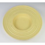 A Keith Murray Wedgwood yellow glazed shallow reeded bowl 36cm