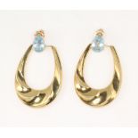 A pair of yellow metal aquamarine half hoop earrings, 5.2 grams