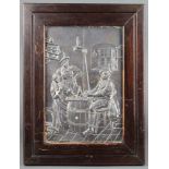 A rectangular embossed metal plaque depicting a tavern interior with figures, contained in a