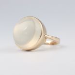 A yellow metal cabochon cut moonstone ring 5.6 grams, size K 1/2