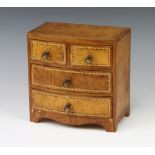 A Georgian style walnut bow front apprentice chest of 2 short and 2 long drawers, raised on