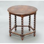 A Victorian circular oak occasional table raised on spiral turned columns with stretcher 59cm h x