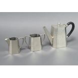 Park Pewter, a 3 piece planished pewter coffee service, base marked Park Pewter M1149 with coffee