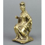 A 19th Century gilt metal finial in the form of Britannia 13cm x 5cm x 6cm (trident missing)