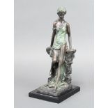 A 20th Century bronze figure of a standing lady raised on a square marble base 29cm h x 12cm x 15cm