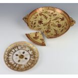 A 19th Century lustre 2 handled shallow bowl decorated with stylised flowers and leaves 30cm,