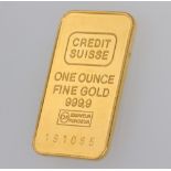 A 31 gram (1 ounce) Credit Suisse fine gold 999.9 ingot, numbered 191085 together with Credit Suisse