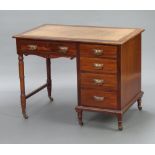 James Shoolbred and Company Ltd., an Edwardian mahogany desk with green inset writing surface