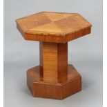 An Art Deco hexagonal and quarter veneered pedestal table on a hexagonal base 23cm x 63cm x 54cm